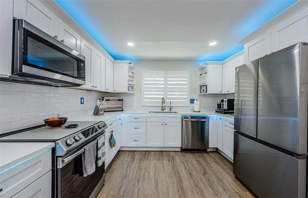 Interior, Kitchen, Recessed Lighting, Stainless Steel Appliances, Wood Texture Flooring