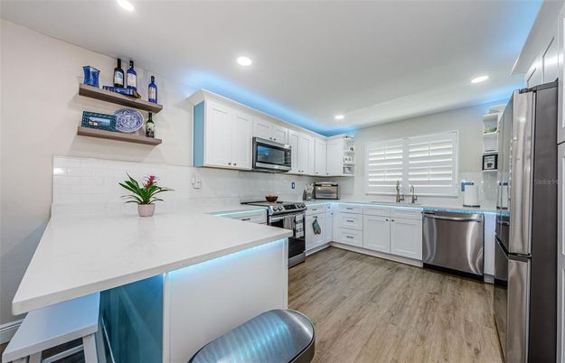 Interior, Kitchen, Recessed Lighting, Stainless Steel Appliances, Wood Texture Flooring