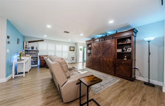 Fireplace, Interior, Living room, Recessed Lighting, Wood Texture Flooring
