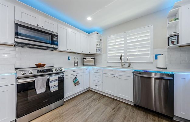 Interior, Kitchen, Recessed Lighting, Stainless Steel Appliances, Wood Texture Flooring