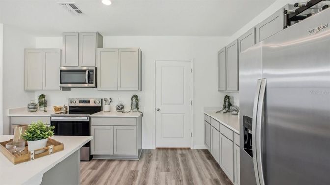 Interior, Kitchen, Recessed Lighting, Stainless Steel Appliances, Wood Texture Flooring