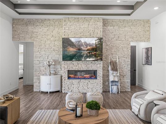 Fireplace, Interior, Recessed Lighting, Stone Walls, Wood Texture Flooring