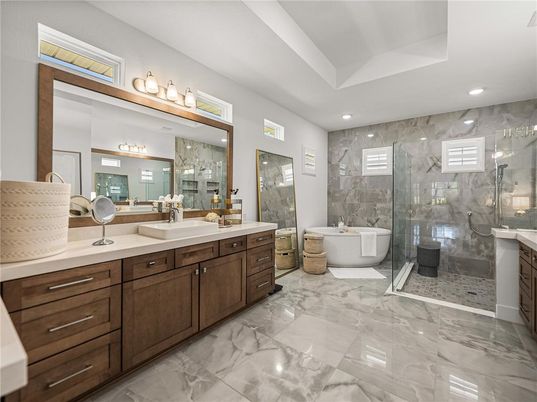 Bathroom, Dual Sink Vanities, Free Standing Baths, Glass Shower, Interior, Marble, Marble Walls, Recessed Lighting