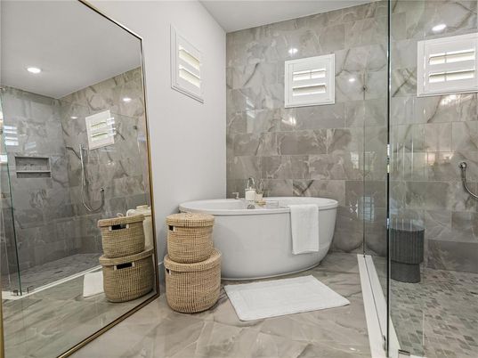 Bathroom, Free Standing Baths, Glass Shower, Interior, Marble Walls, Recessed Lighting