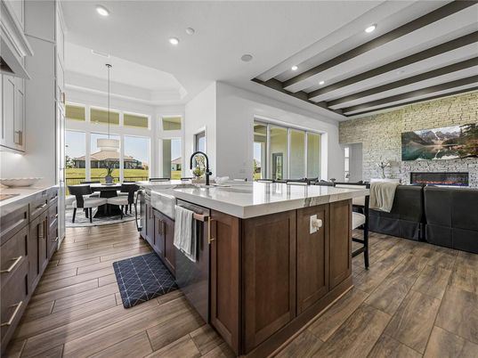 Dining room, Fireplace, Interior, Kitchen, Living room, Pendant Lights, Recessed Lighting, Stone Walls, Wood Texture Flooring