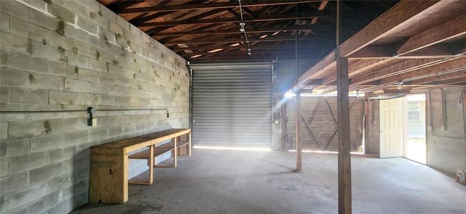 Garage, Interior, Stone Walls, Wooden Beams
