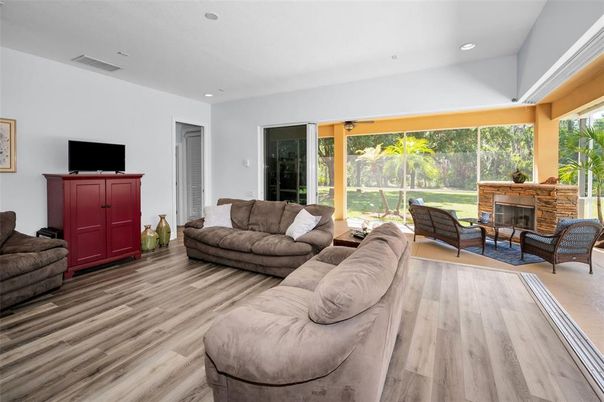 Fireplace, Interior, Living room, Recessed Lighting, Wood Texture Flooring