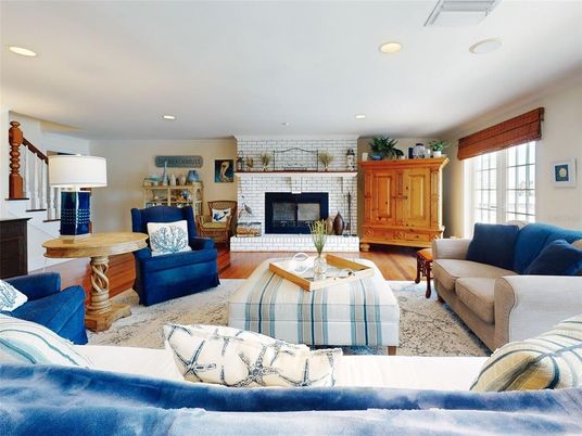 Fireplace, Interior, Living room, Recessed Lighting, Stone Walls, Wood Texture Flooring