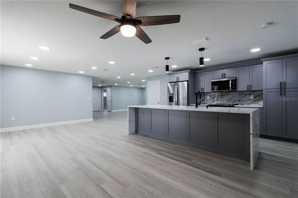 Interior, Kitchen, Pendant Lights, Recessed Lighting, Stainless Steel Appliances, Wood Texture Flooring