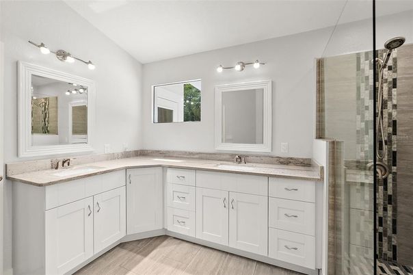 Bathroom, Dual Sink Vanities, Glass Shower, Interior, Wood Texture Flooring