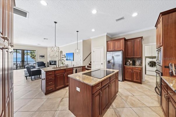 Dining room, Fireplace, Interior, Kitchen, Living room, Pendant Lights, Recessed Lighting, Stainless Steel Appliances