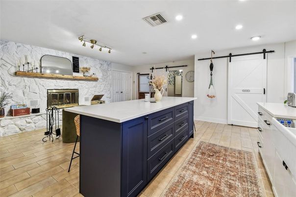 Fireplace, Interior, Kitchen, Marble Walls, Recessed Lighting, Wood Texture Flooring