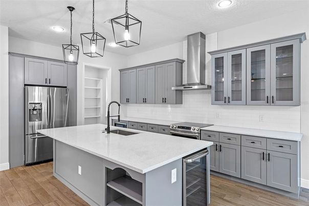Interior, Kitchen, Pendant Lights, Recessed Lighting, Stainless Steel Appliances, Wood Texture Flooring