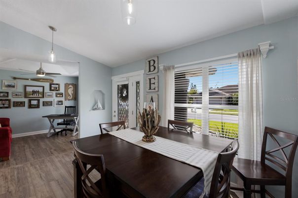 Dining room, Interior, Pendant Lights, Piano, Wood Texture Flooring