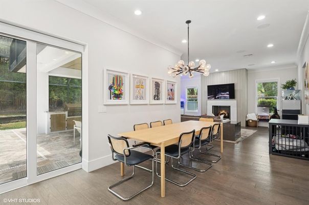 Dining room, Fireplace, Interior, Living room, Pendant Lights, Recessed Lighting, Wood Texture Flooring