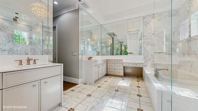 Bathroom, Dual Sink Vanities, Glass Shower, Interior, Marble, Marble Walls, Recessed Lighting