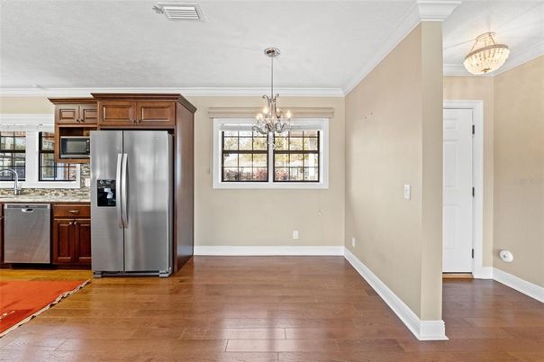 Chandelier, Interior, Kitchen, Pendant Lights, Stainless Steel Appliances, Wood Texture Flooring