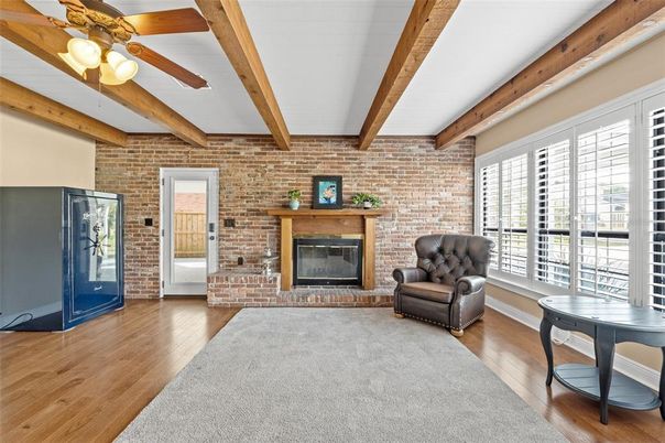 Empty room, Fireplace, Interior, Stone Walls, Wooden Beams, Wood Texture Flooring