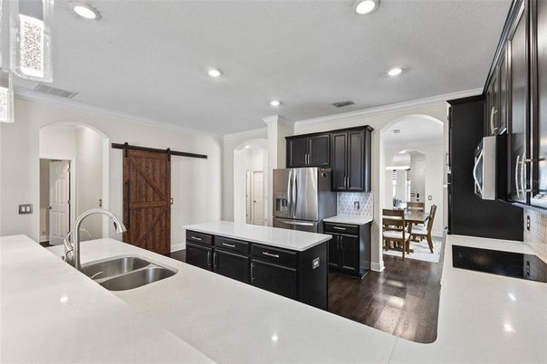 Dining room, Interior, Kitchen, Recessed Lighting, Stainless Steel Appliances, Wood Texture Flooring