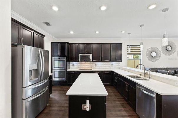 Interior, Kitchen, Pendant Lights, Recessed Lighting, Stainless Steel Appliances, Wood Texture Flooring