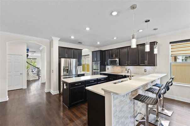 Interior, Kitchen, Pendant Lights, Recessed Lighting, Stainless Steel Appliances, Wood Texture Flooring