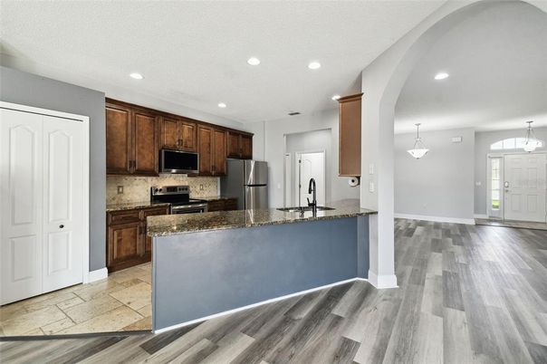 Interior, Kitchen, Pendant Lights, Recessed Lighting, Stainless Steel Appliances, Wood Texture Flooring