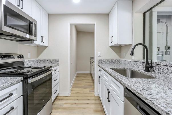 Interior, Kitchen, Recessed Lighting, Stainless Steel Appliances, Wood Texture Flooring