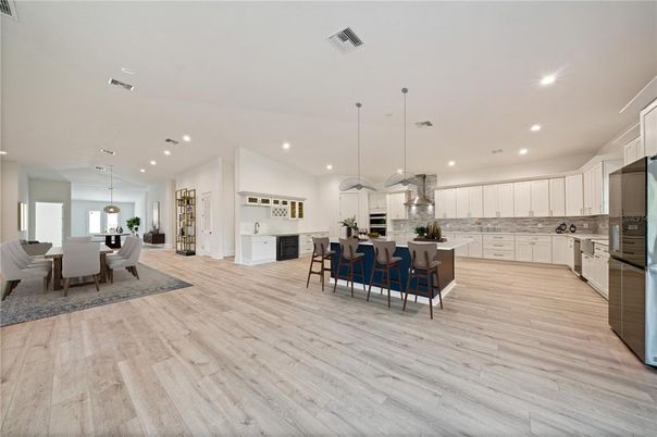 Dining room, Interior, Kitchen, Pendant Lights, Recessed Lighting, Stainless Steel Appliances, Wood Texture Flooring