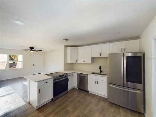 Interior, Kitchen, Recessed Lighting, Stainless Steel Appliances, Wood Texture Flooring