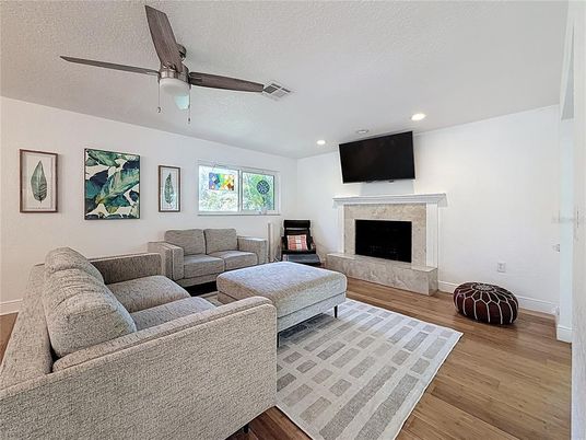 Fireplace, Interior, Living room, Recessed Lighting, Wood Texture Flooring