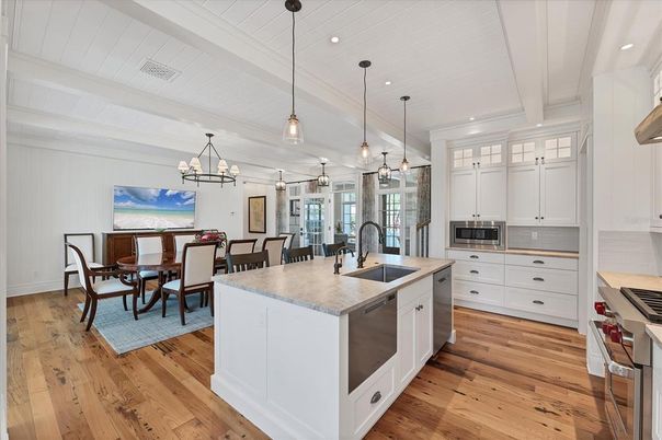 Chandelier, Dining room, Interior, Kitchen, Pendant Lights, Recessed Lighting, Stainless Steel Appliances, Wood Texture Flooring