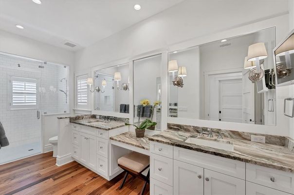 Bathroom, Dual Sink Vanities, Glass Shower, Interior, Recessed Lighting, Wood Texture Flooring
