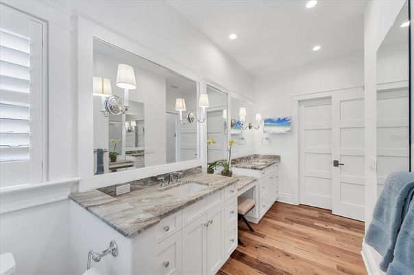 Bathroom, Dual Sink Vanities, Interior, Recessed Lighting, Wood Texture Flooring