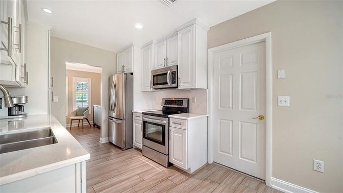 Interior, Kitchen, Recessed Lighting, Stainless Steel Appliances, Wood Texture Flooring