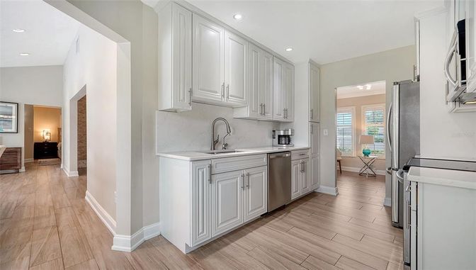 Interior, Kitchen, Recessed Lighting, Stainless Steel Appliances, Wood Texture Flooring