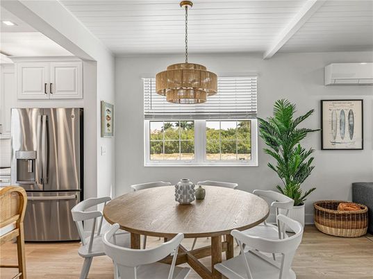 Chandelier, Dining room, Interior, Kitchen, Pendant Lights, Recessed Lighting, Stainless Steel Appliances, Wood Texture Flooring