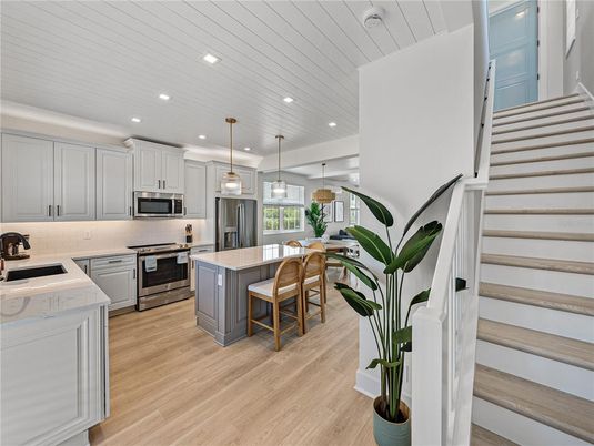 Interior, Kitchen, Pendant Lights, Recessed Lighting, Stainless Steel Appliances, Wood Texture Flooring