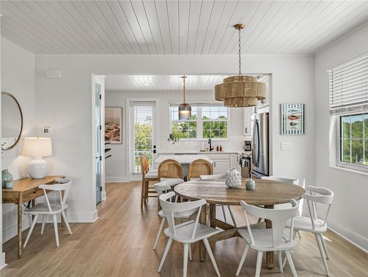Chandelier, Dining room, Interior, Kitchen, Pendant Lights, Stainless Steel Appliances, Wood Texture Flooring
