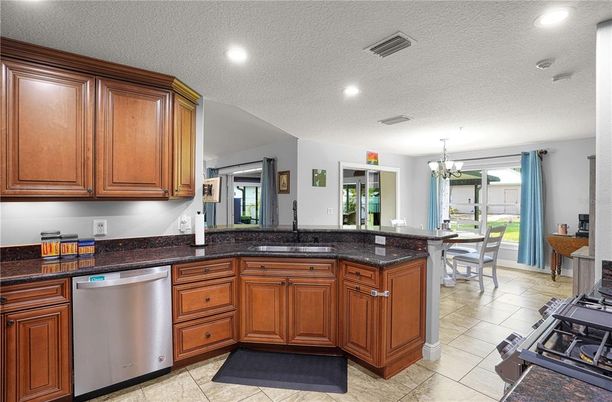 Chandelier, Dining room, Interior, Kitchen, Recessed Lighting, Stainless Steel Appliances