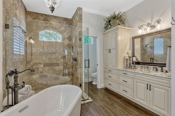 Bathroom, Dual Sink Vanities, Free Standing Baths, Glass Shower, Interior, Wood Texture Flooring