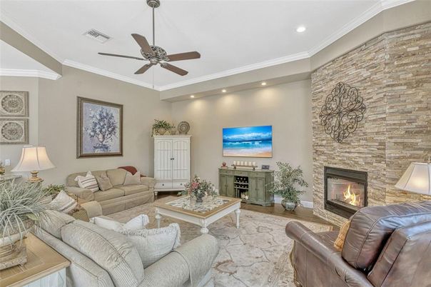 Fireplace, Interior, Living room, Recessed Lighting, Stone Walls, Wood Texture Flooring