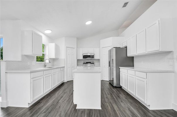 Interior, Kitchen, Recessed Lighting, Stainless Steel Appliances, Wood Texture Flooring