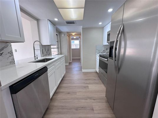 Interior, Kitchen, Recessed Lighting, Stainless Steel Appliances, Wood Texture Flooring