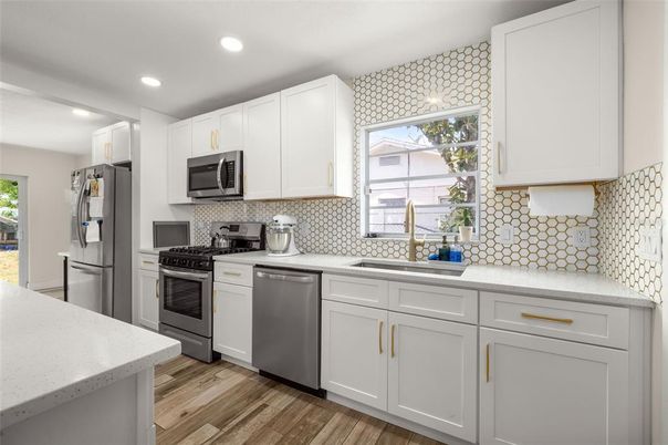 Interior, Kitchen, Recessed Lighting, Stainless Steel Appliances, Wood Texture Flooring