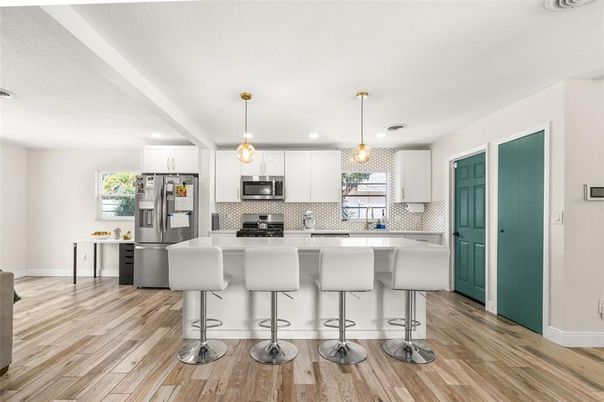 Interior, Kitchen, Pendant Lights, Recessed Lighting, Stainless Steel Appliances, Wood Texture Flooring