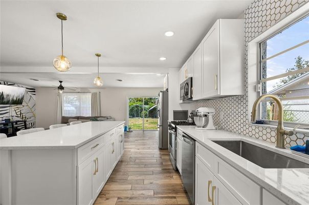 Interior, Kitchen, Pendant Lights, Recessed Lighting, Stainless Steel Appliances, Wood Texture Flooring