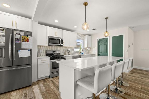 Interior, Kitchen, Pendant Lights, Recessed Lighting, Stainless Steel Appliances, Wood Texture Flooring