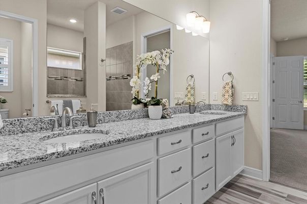 Bathroom, Dual Sink Vanities, Interior, Recessed Lighting, Wood Texture Flooring