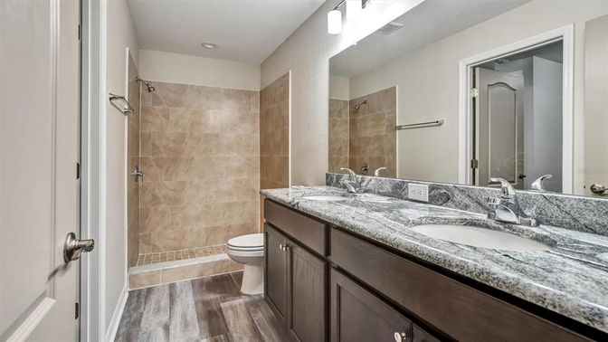 Bathroom, Dual Sink Vanities, Interior, Recessed Lighting, Wood Texture Flooring