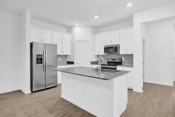 Interior, Kitchen, Recessed Lighting, Stainless Steel Appliances, Wood Texture Flooring